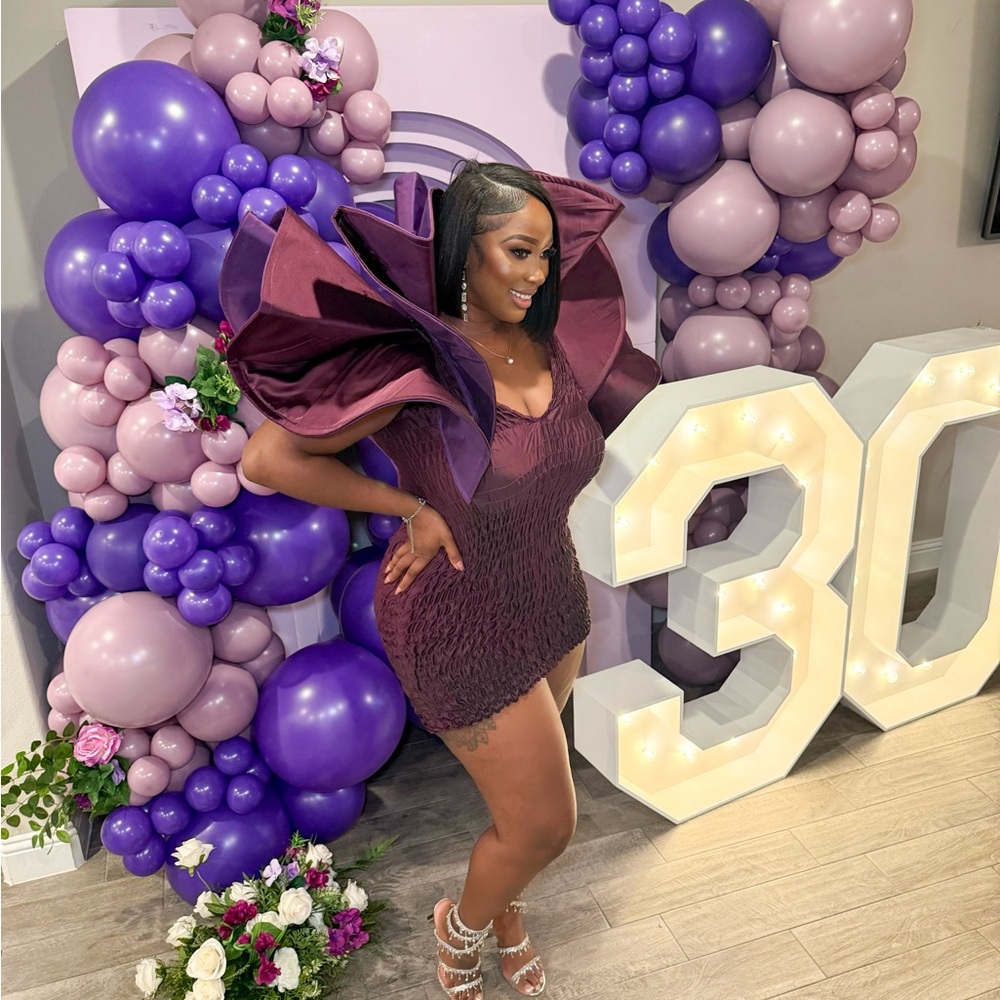Elegant Purple Dress with Statement Sleeves